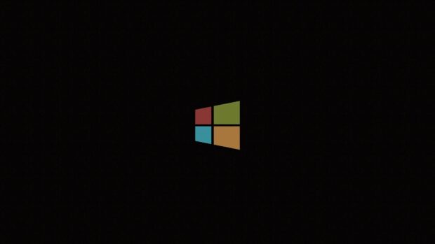 Minimalist Microsoft logo in simple colors on black background