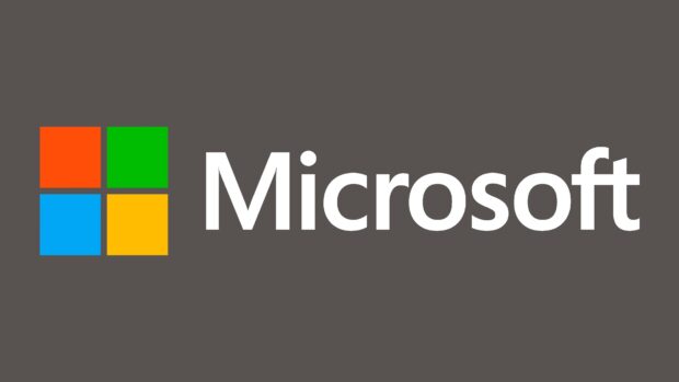 Microsoft logo with colorful squares on dark background for laptop wallpaper