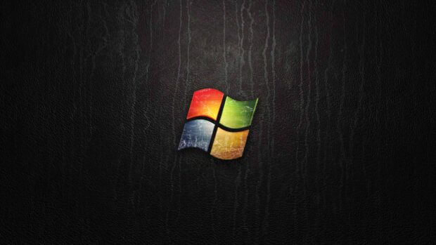Vintage Microsoft logo on textured black leather background