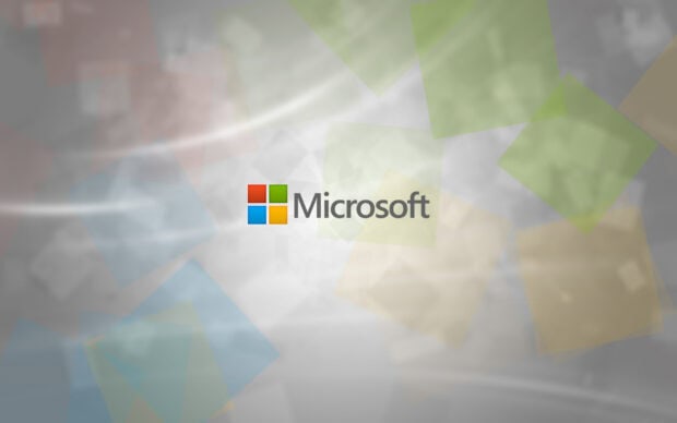 Colorful translucent squares with Microsoft logo on a blurred background