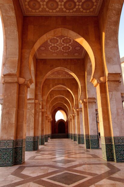 Beautiful Middle East arches with detailed mosaic patterns and warm natural light