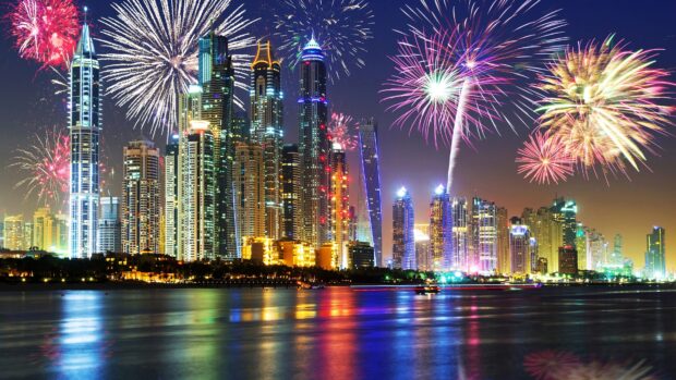 Dubai city skyline with fireworks at night showcasing Middle East architecture