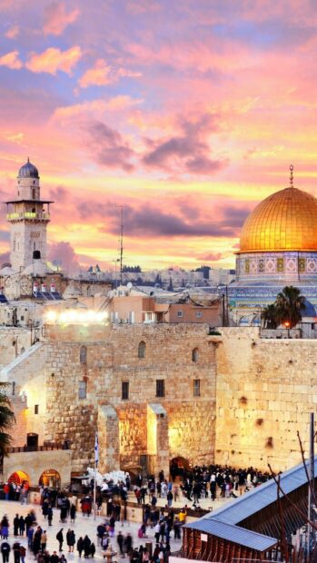 Ancient Middle East architecture and culture at sunset with golden dome and stone walls