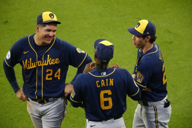 Milwaukee players from Milwaukee Brewers talking on the field in their uniforms