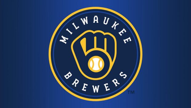 Milwaukee Brewers logo with a baseball glove and ball on a blue background