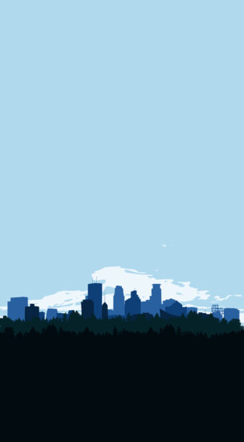 The Minneapolis city skyline silhouette with trees against a clear blue sky