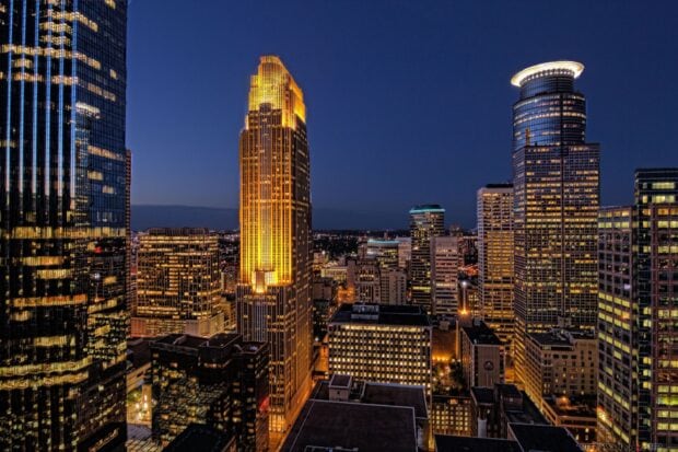 Minneapolis city skyline at night with illuminated skyscrapers
