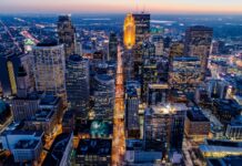 Minneapolis skyline with illuminated buildings at dusk in the city center