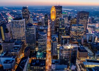 Minneapolis skyline with illuminated buildings at dusk in the city center
