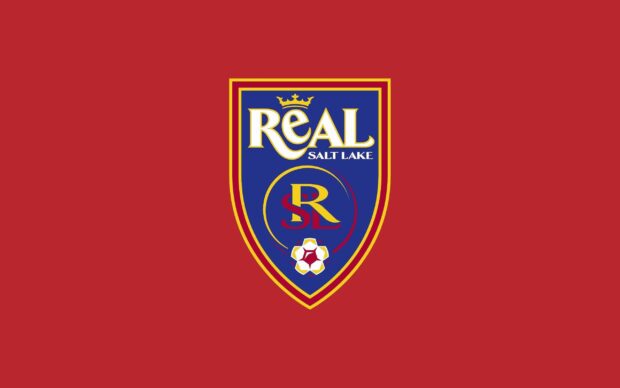 Real Salt Lake emblem with blue and red colors displayed on a red background