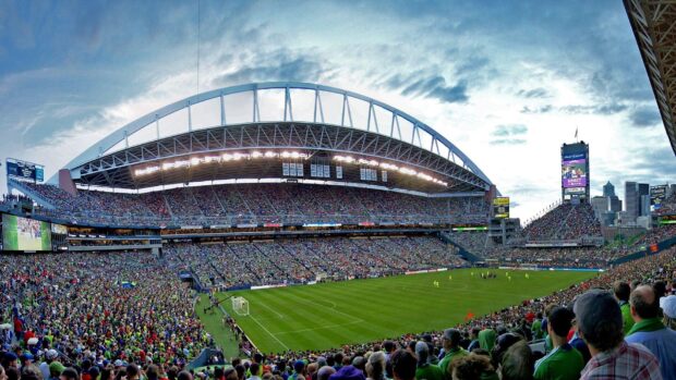 A panoramic view of a soccer stadium filled with fans during a major Mls match