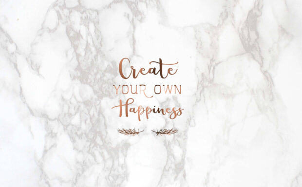 Create your own happiness motivational quote on white marble texture background