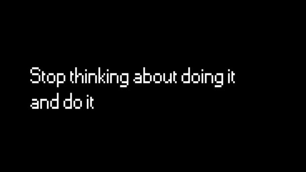 Motivational phrase stop thinking about doing it and do it on a black background