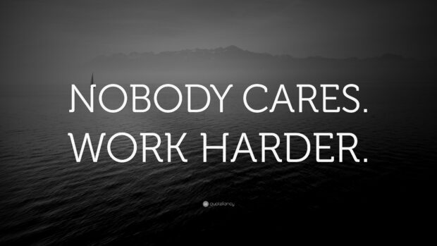 Motivational quote nobody cares work harder over calm dark sea and distant mountains