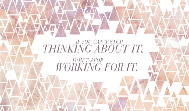 Inspirational quote about thinking and working surrounded by abstract triangle pattern