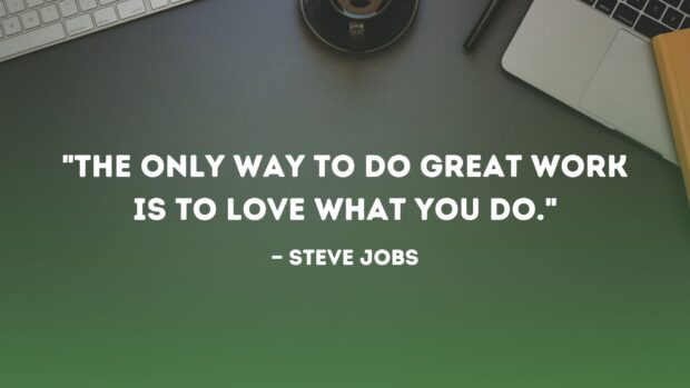 Motivational quote about work and love on a green desktop with keyboard and coffee cup