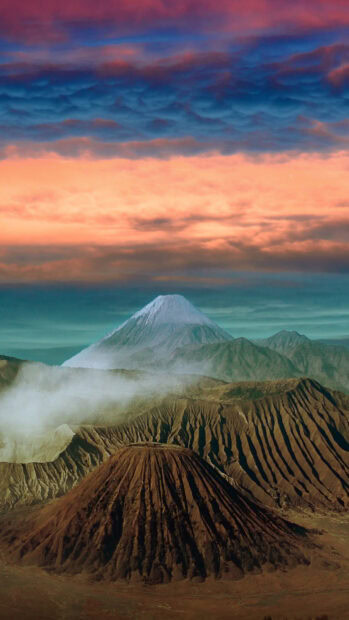 Stunning Mount Bromo with misty volcanic landscapes under a vibrant colorful sky