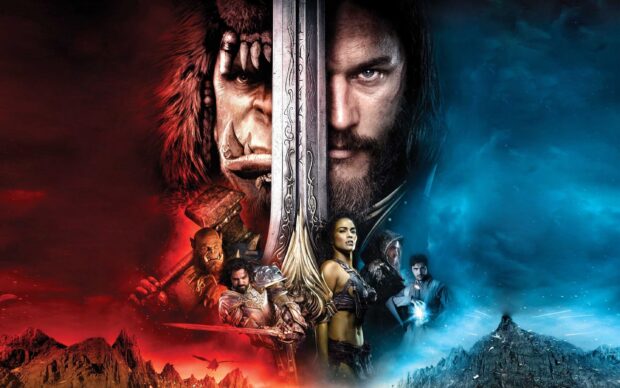 The movie poster displays a clash between an orc warrior and a human with a sword in a fantasy setting