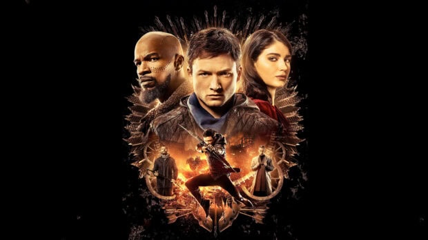 The witcher characters in intense action pose on a detailed fantasy background