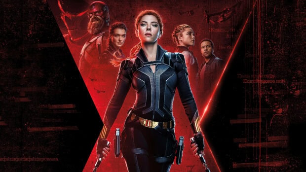 A movie poster featuring a confident female spy standing in front of her team in a red and black setting