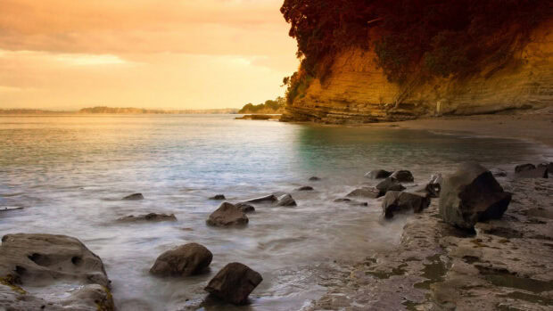 Rocky coastline at sunset captured in National Geographic nature