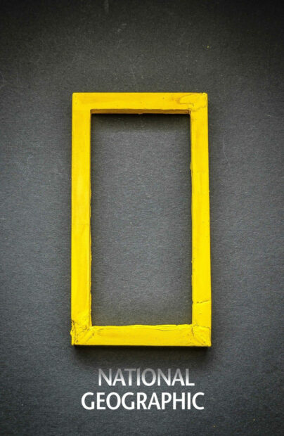 Yellow rectangular frame representing National Geographic on dark background National Geographic