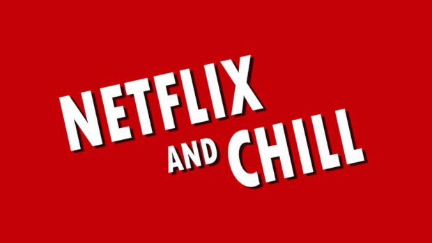 Netflix text and chill phrase on red background for laptop wallpaper