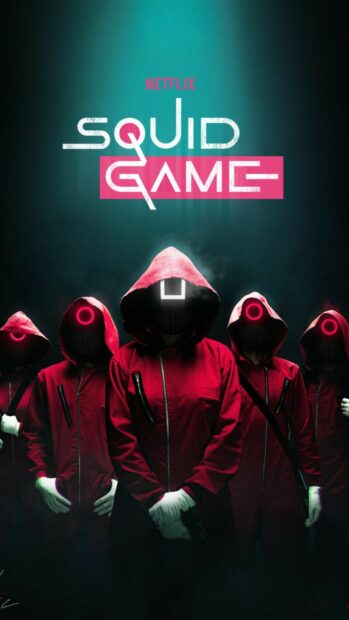 Squid Game characters in red hooded suits from Netflix standing in a dark misty setting