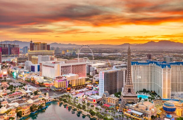 A vibrant view of Nevada cityscape at sunset featuring iconic landmarks and a clear sky