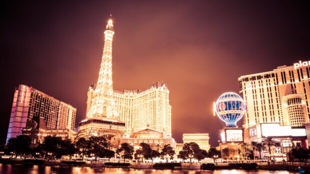 Illuminated replica of the Eiffel Tower and surrounding buildings in Nevada at night