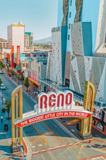 Reno arch with rock climbing walls and cityscape in Nevada