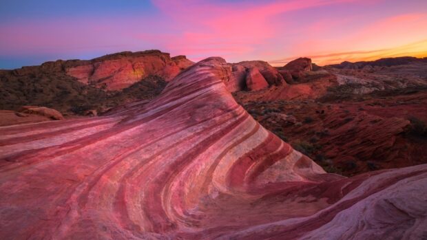 Stunning Nevada rock formation with colorful layered patterns at sunset