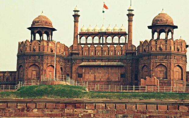 Historic Red Fort in New Delhi with Indian flag on top