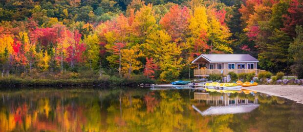 Autumn forest and lake scenery with colorful foliage in New Hampshire
