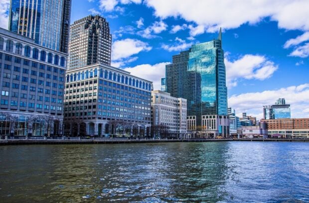 Modern New Jersey city skyline with tall buildings and water view on a clear day