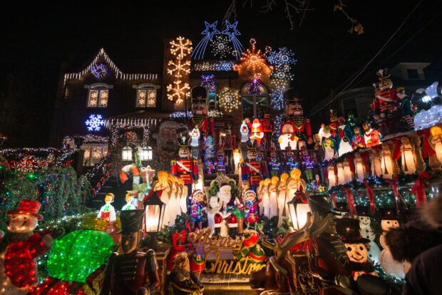 Christmas decorations with nutcrackers and lights on a New York house