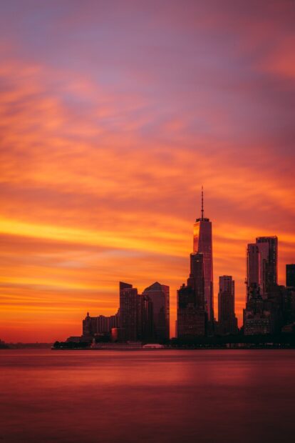 New York sunset with colorful sky over the city skyline at dusk