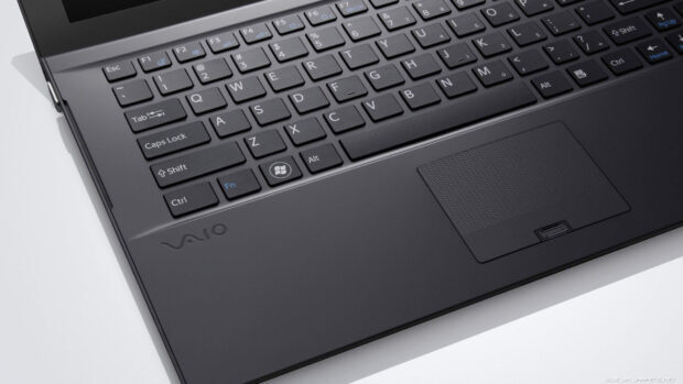 Close up of a notebook keyboard and touchpad showing keys and functions on a laptop
