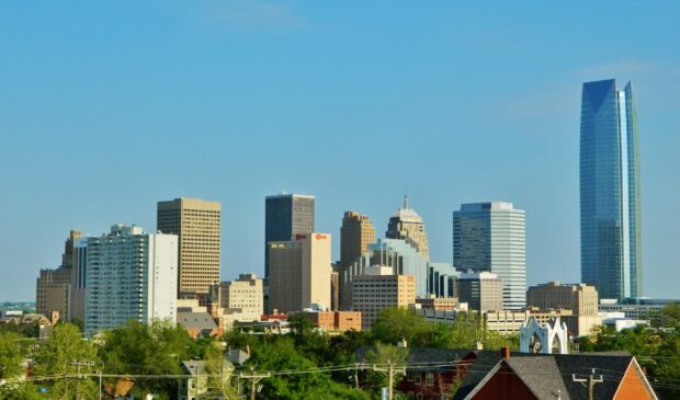 Oklahoma City skyline with clear blue sky and tall buildings in daylight