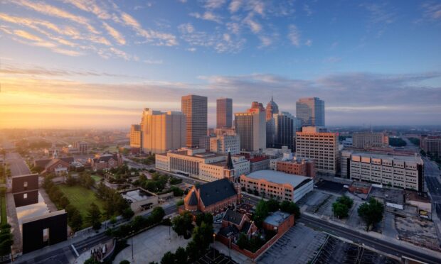 Oklahoma City skyline with tall buildings and a colorful sunrise in HD quality