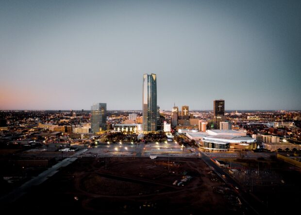 A stunning view of Oklahoma City skyline featuring modern skyscrapers and urban landscape at dusk