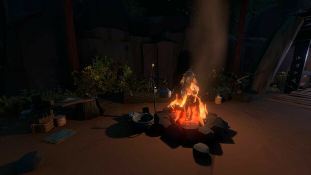 A campfire scene with an astronaut character from Outer Wilds surrounded by camping gear at night