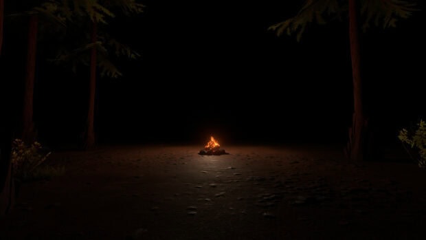 A lonely campfire illuminated in the dark forest in Outer Wilds