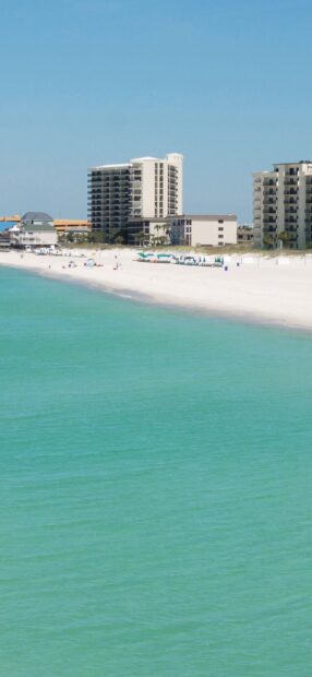 Panama City coastal skyline with turquoise water and sandy beach in high definition