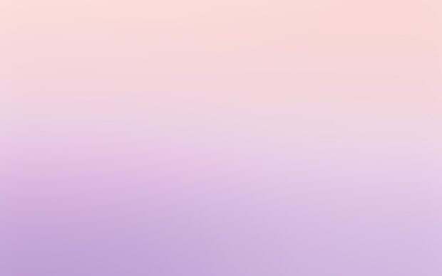 A smooth gradient of pastel colors blending soft pink and lavender hues