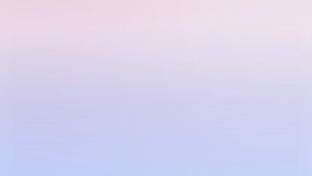 A smooth gradient of pastel colors blending softly from pale pink to light blue