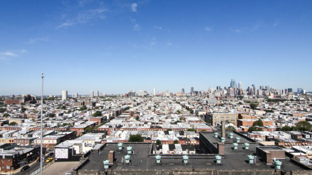 A clear sky view of Philadelphia Pennsylvania with residential and downtown buildings visible