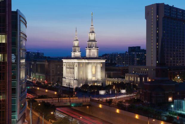 Historic Philadelphia Pennsylvania skyline with illuminated church towers at dusk