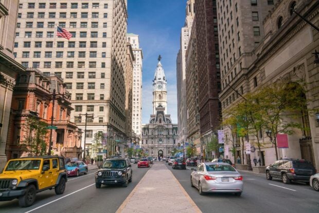 Philadelphia Pennsylvania downtown street with historic architecture and American flag visible