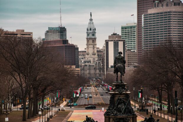 View of Philadelphia cityscape with historic statue and buildings in Pennsylvania